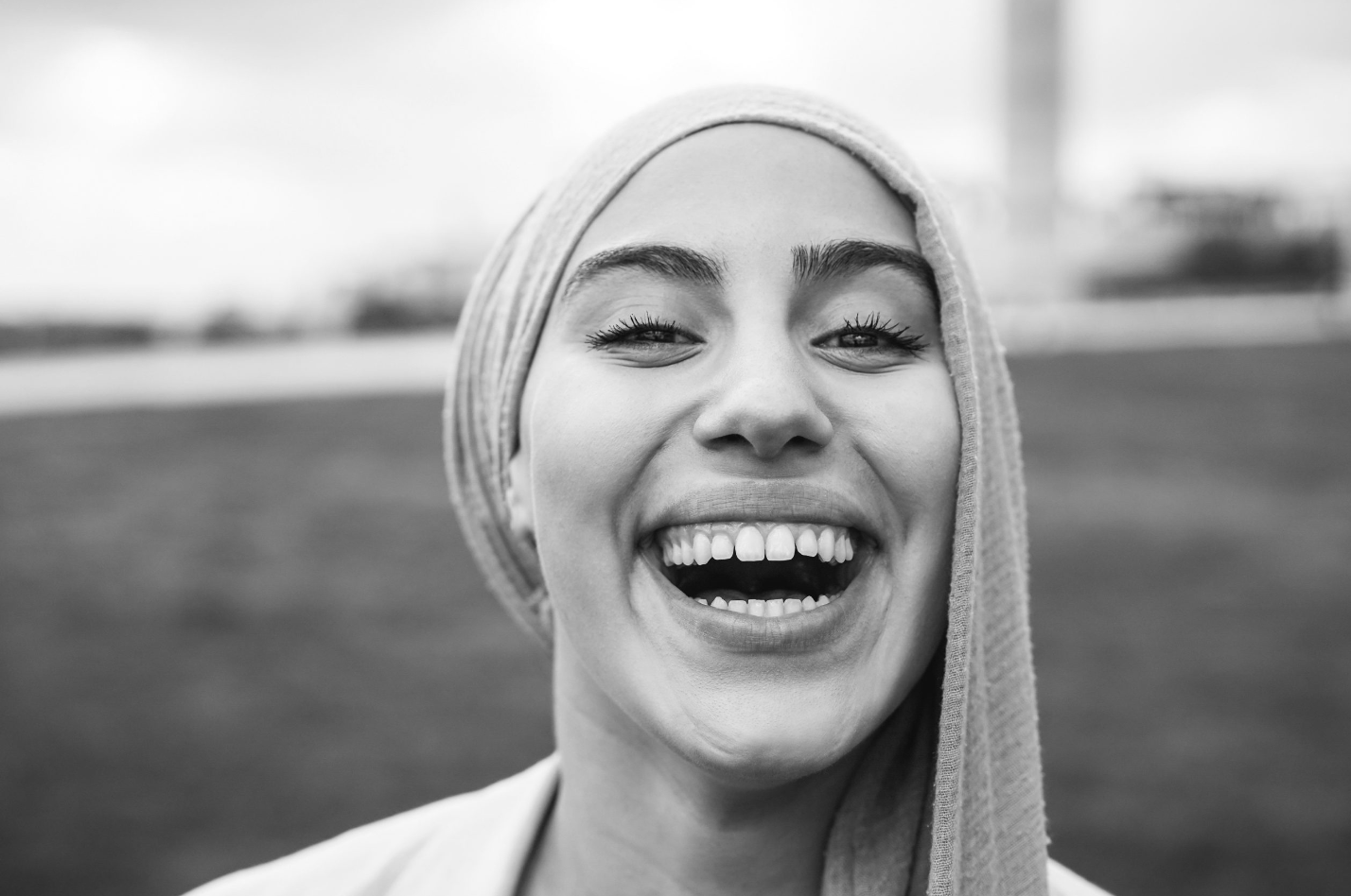 a woman with a scarf on her head