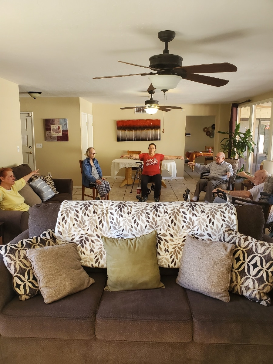 a group of people in a living room