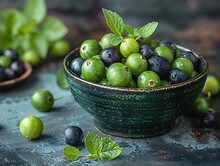 a bowl of blueberries and blackberries