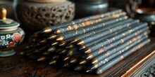 a group of black pencils