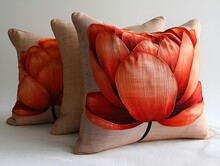 a group of pillows with a flower design on them