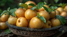 a bowl of fruit with leaves