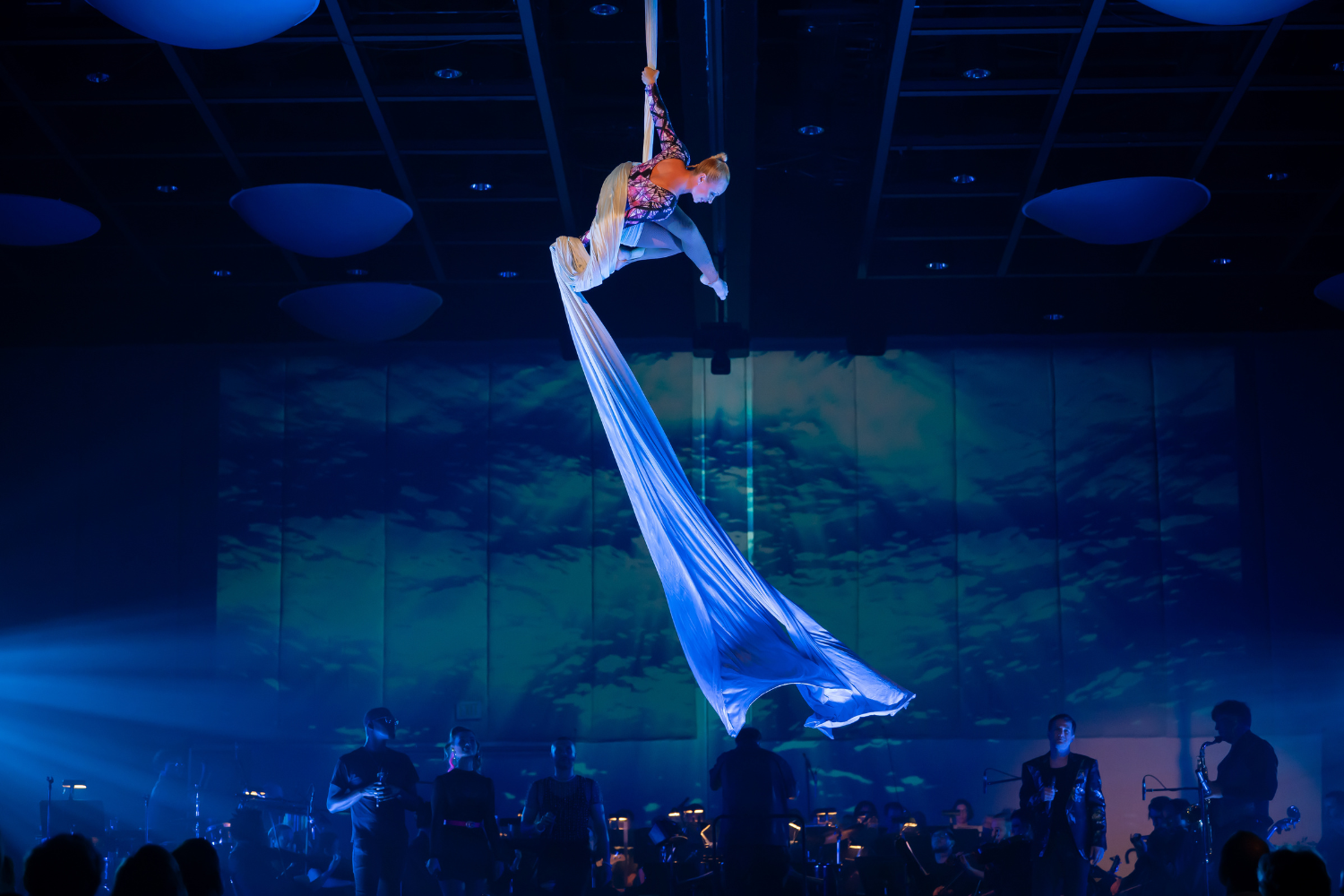 a woman from a rope with a blue cloth