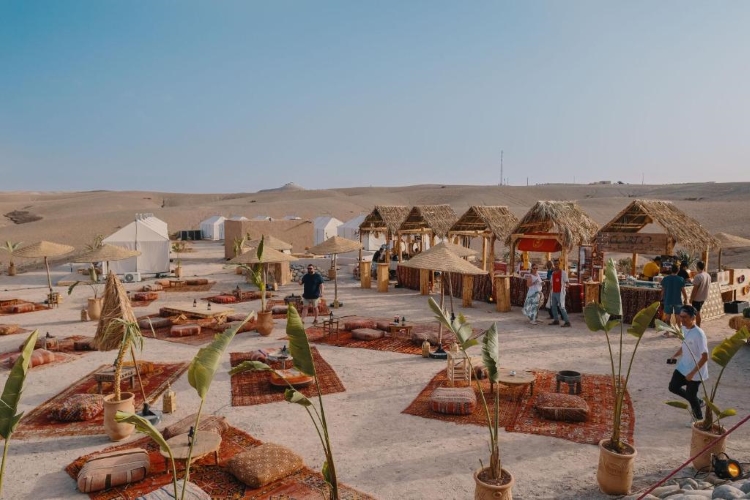 a group of tents in a desert