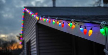 a string of christmas lights on a roof