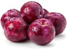 a group of plums with water droplets on them