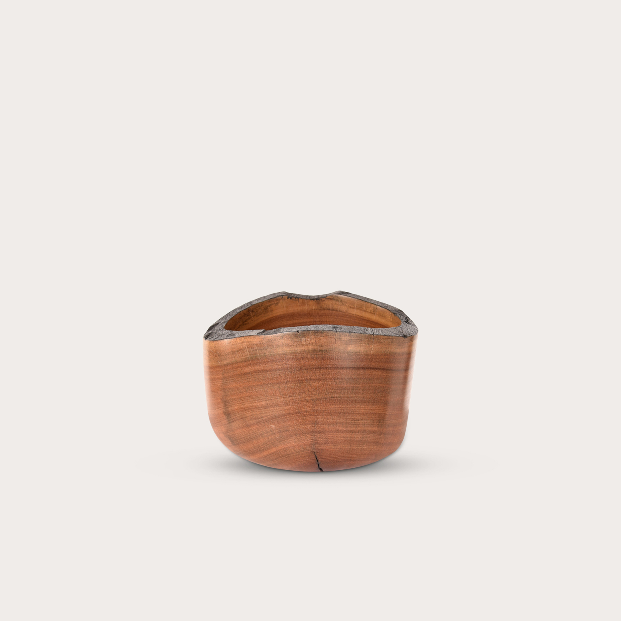 a wooden bowl with a white background