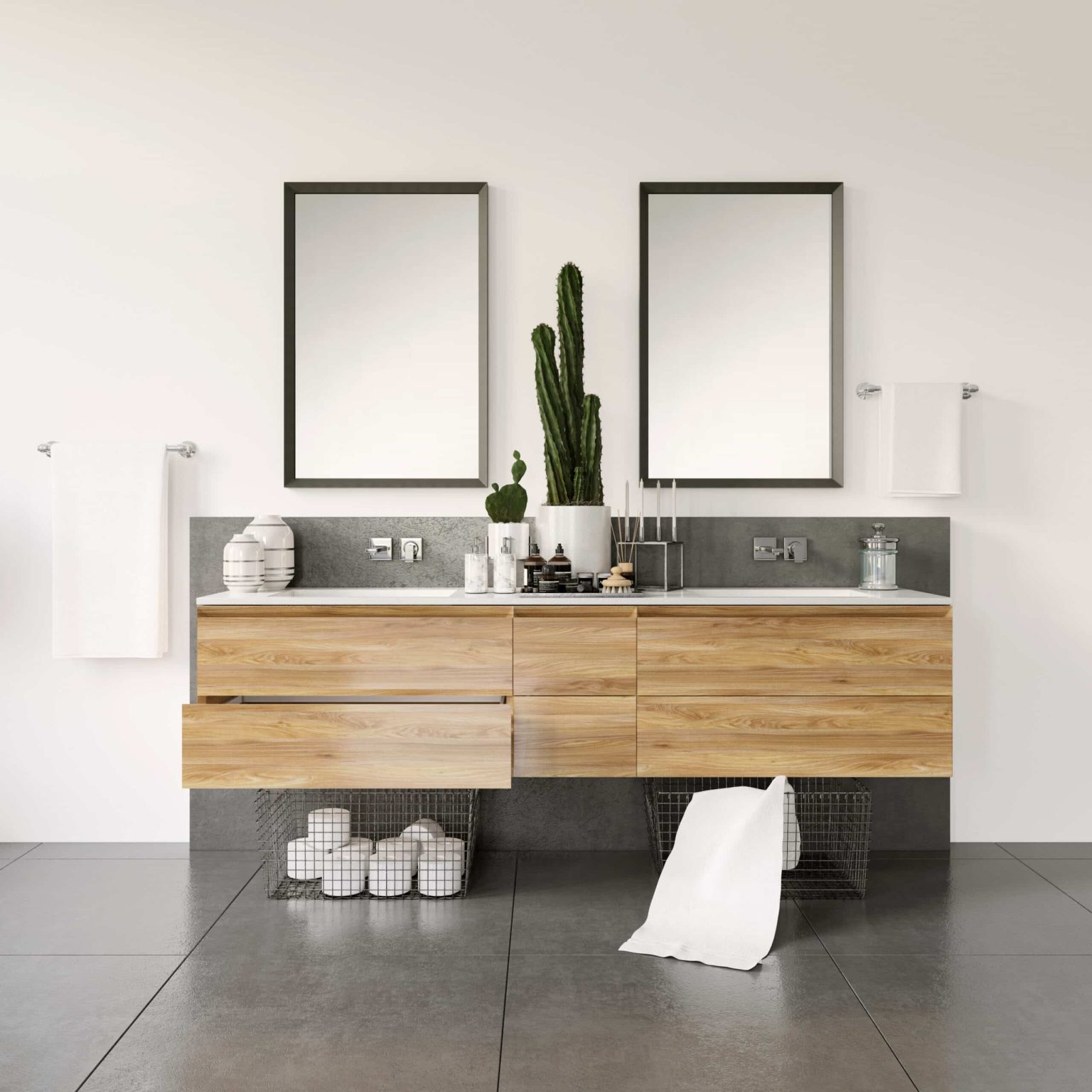 a bathroom with a double sink vanity and two mirrors