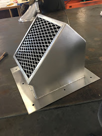 a metal vent on a table