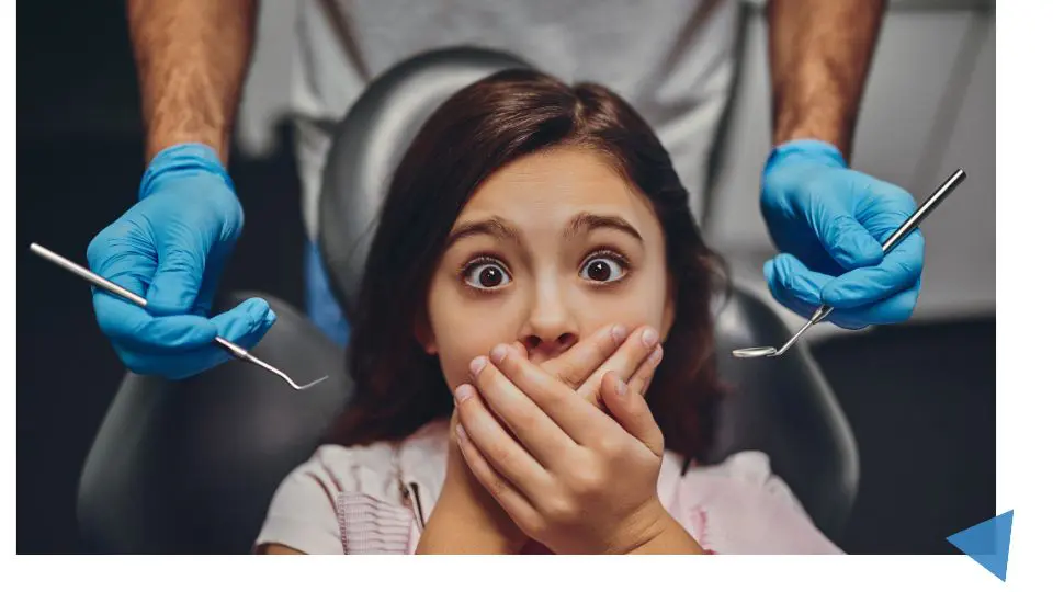 a girl in a dentist chair
