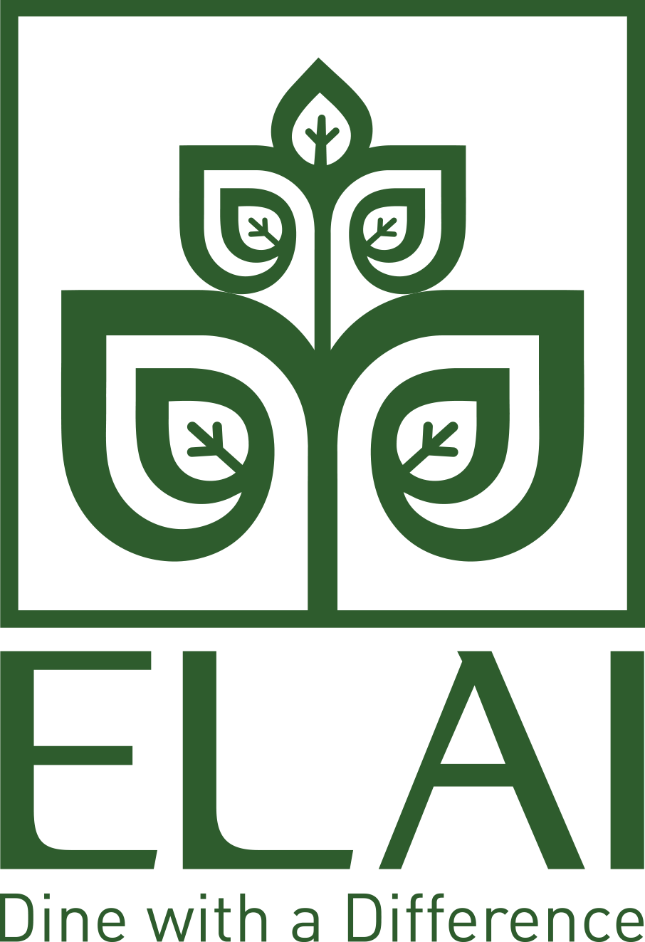 a logo with green leaves