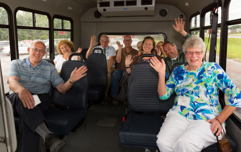 a group of people in a bus