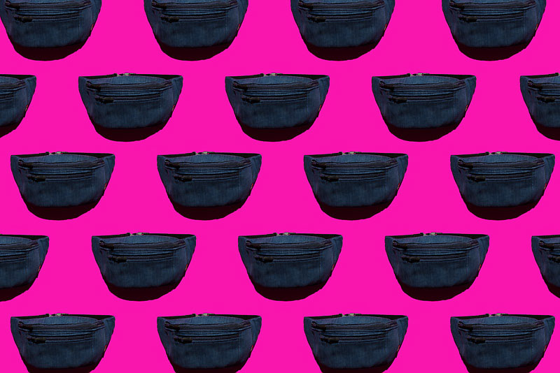 a pattern of blue jeans on a pink background