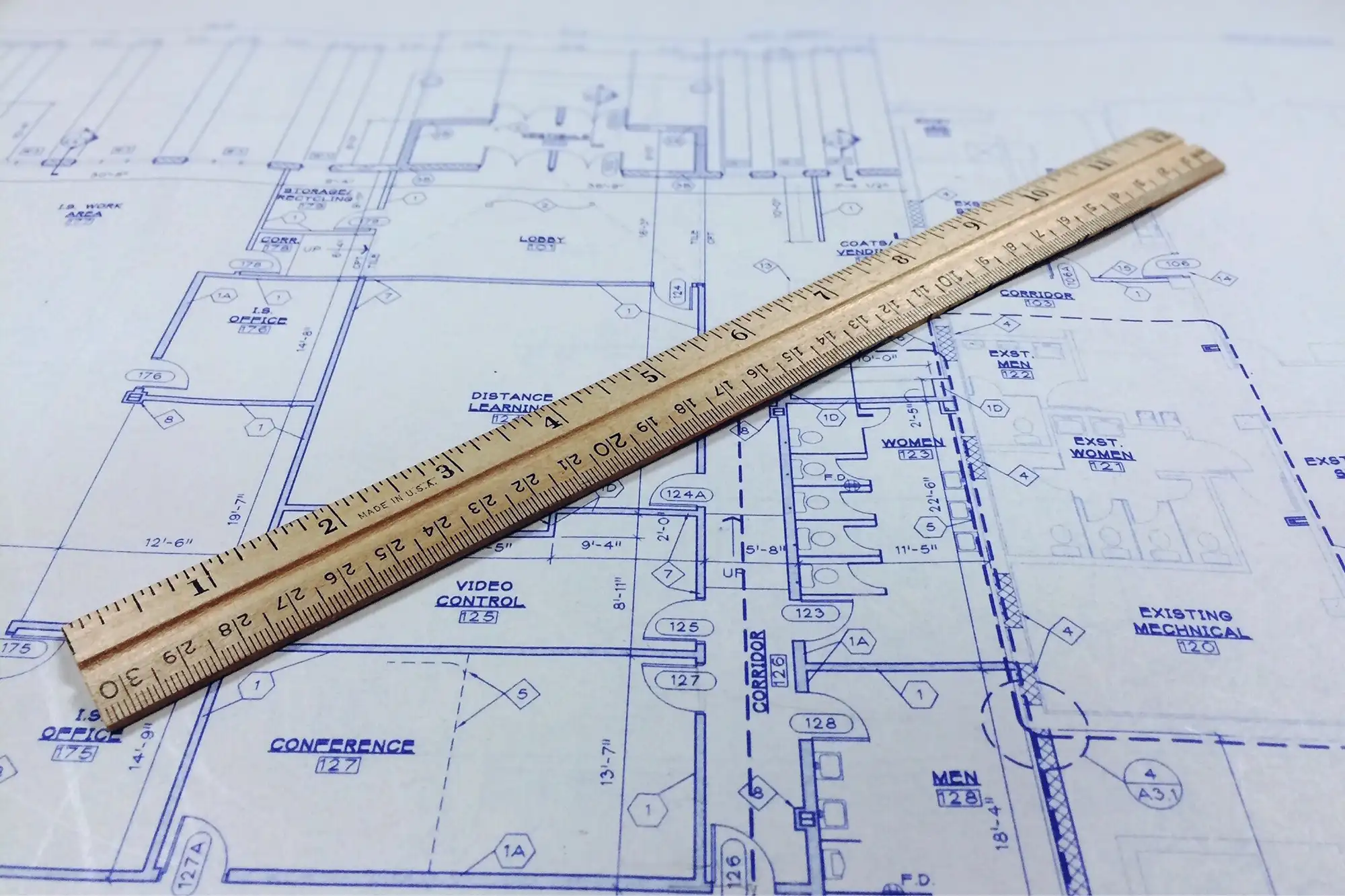 a ruler on a blueprint