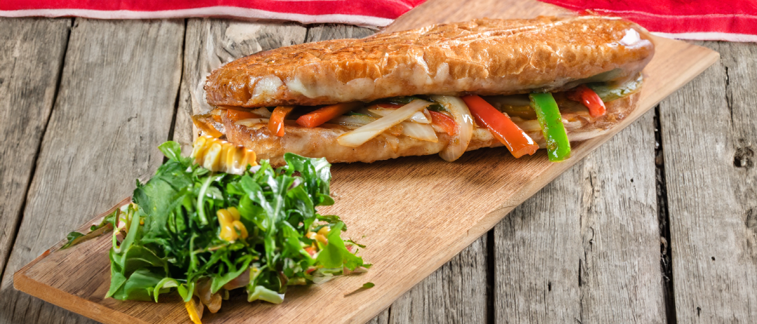 a sandwich on a cutting board