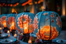 a group of lanterns with flowers on them