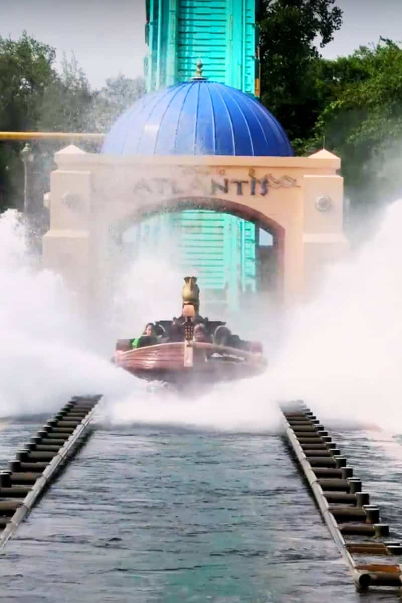 a water ride with a blue dome and a blue roof