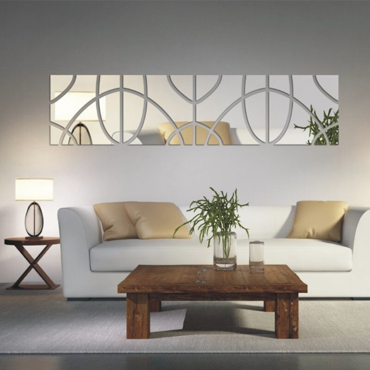 a white couch and a coffee table in a room