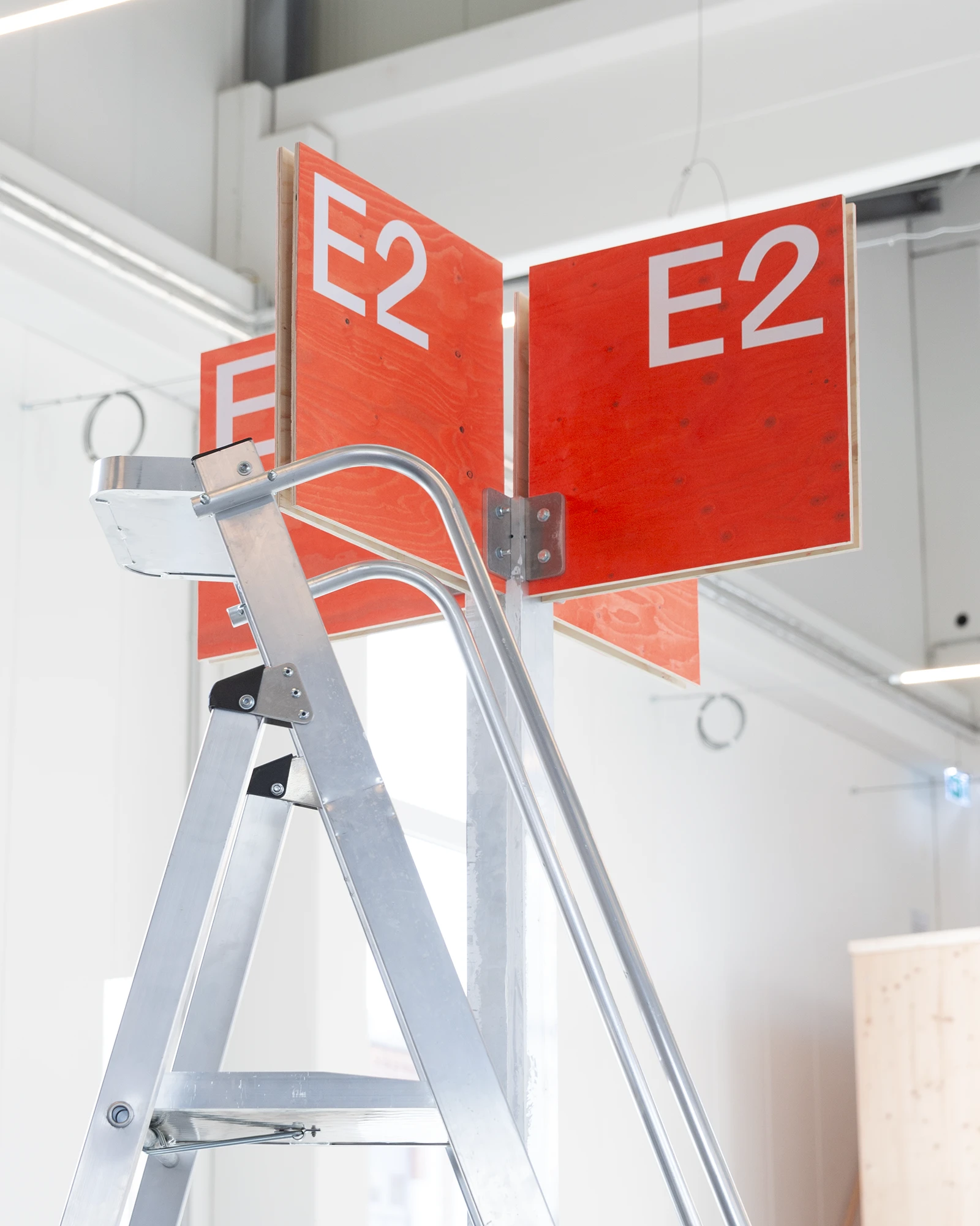 a ladder with red signs on it