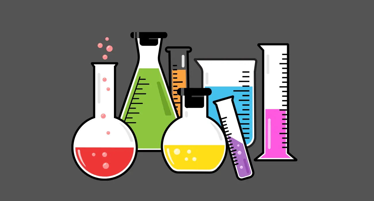 a group of beakers with different colored liquids
