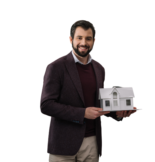 a man holding a model of a house