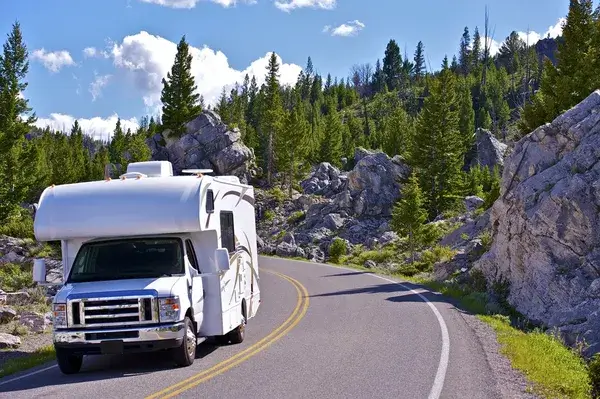 a white rv on a road