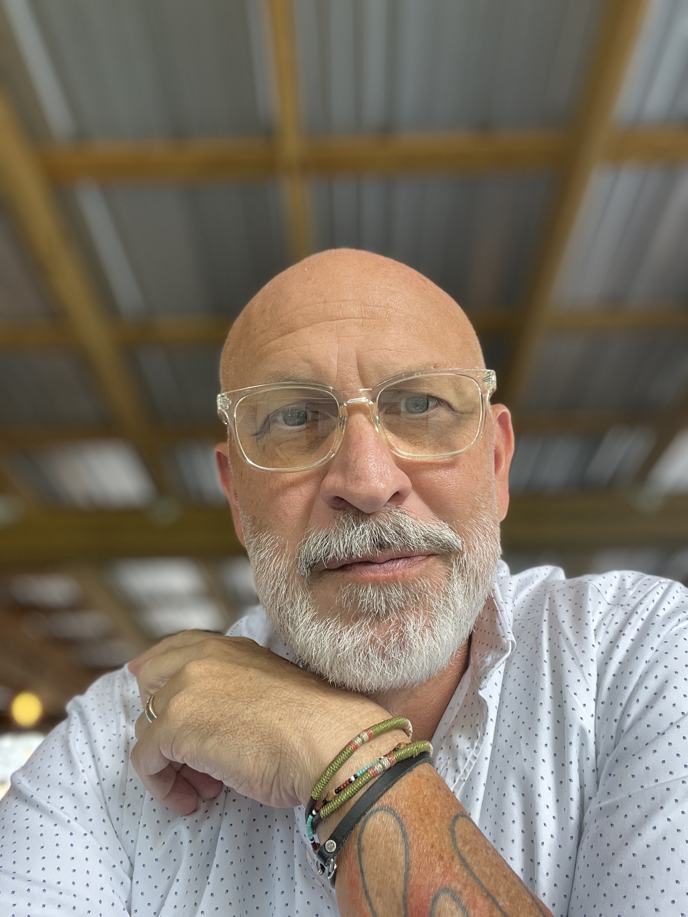 a man with white beard and glasses