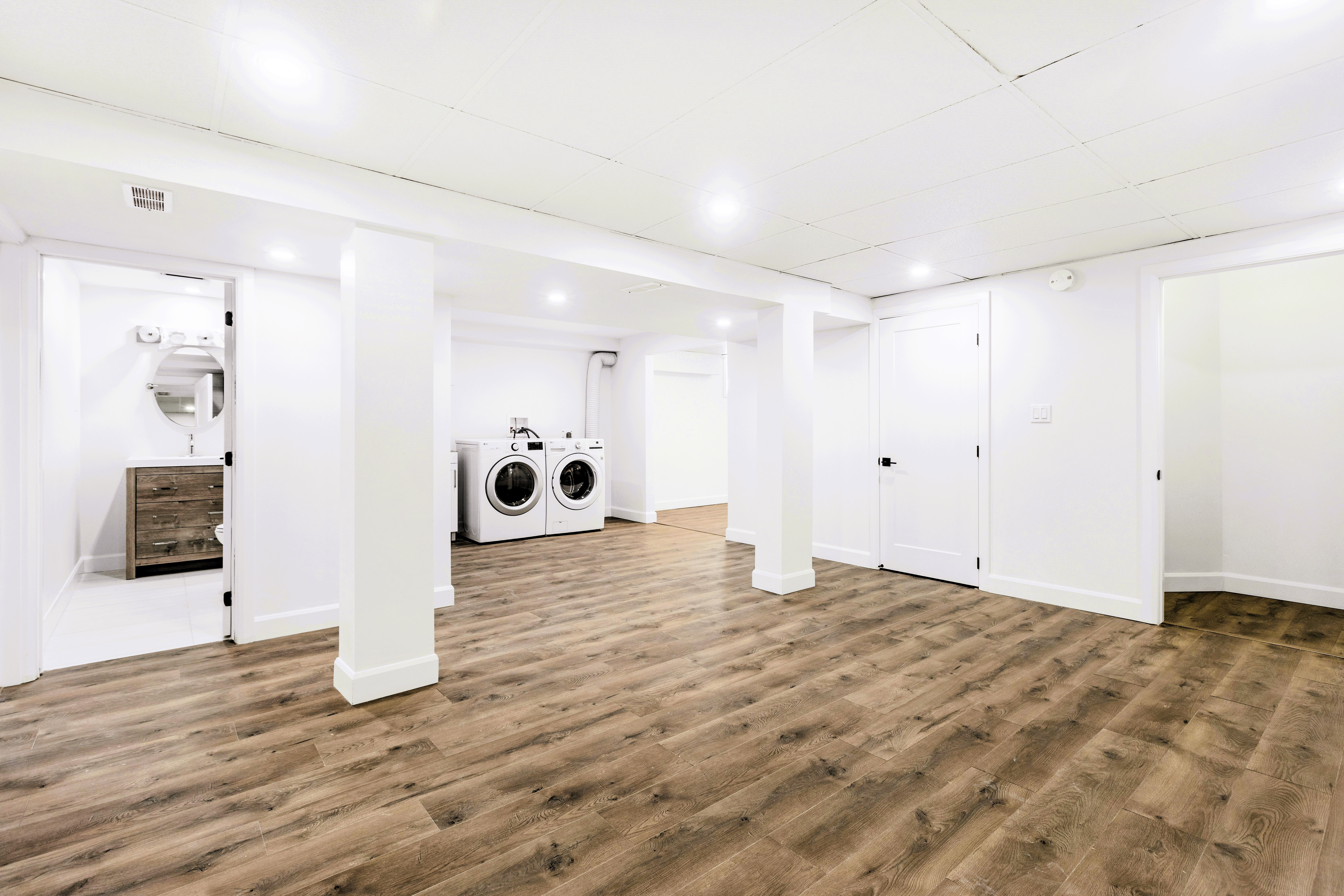 a room with white walls and a washing machine