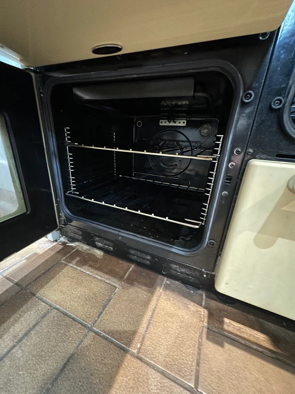 an open oven with a door open