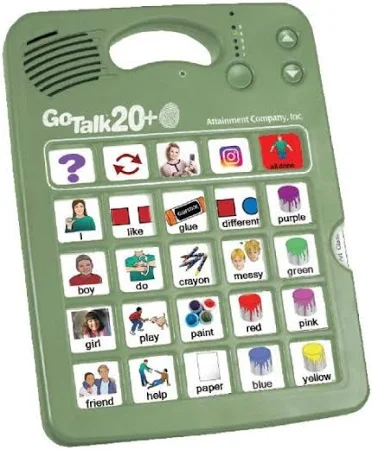 a green electronic device with many buttons