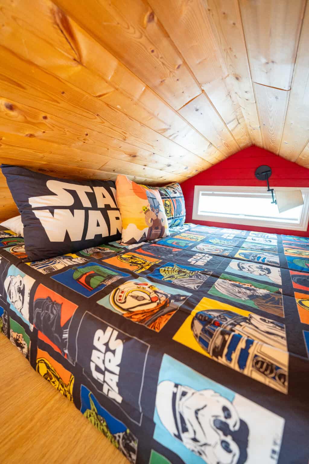 a bed with a star wars theme on it