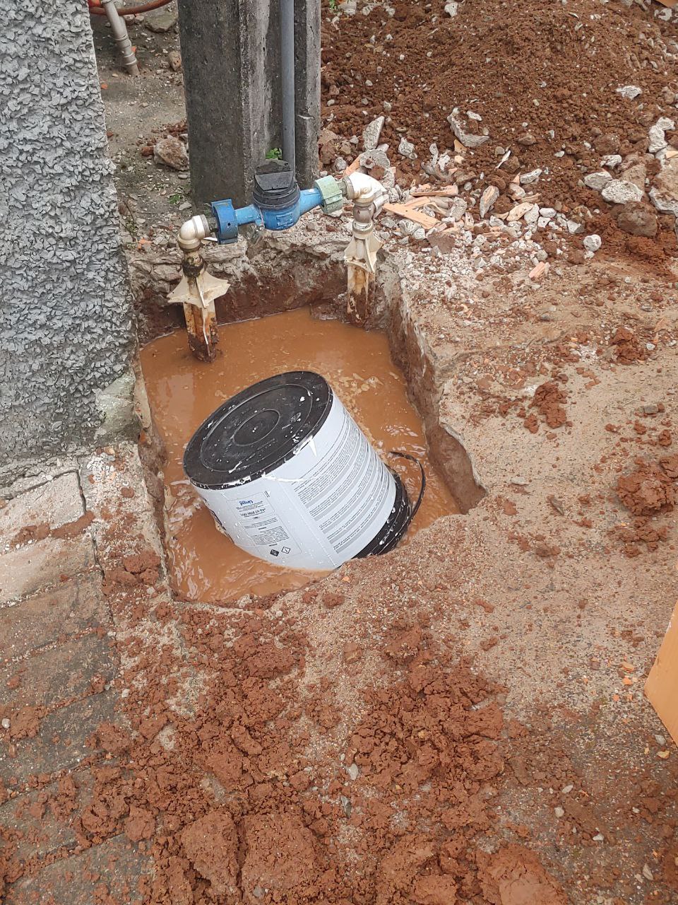 a bucket in the ground