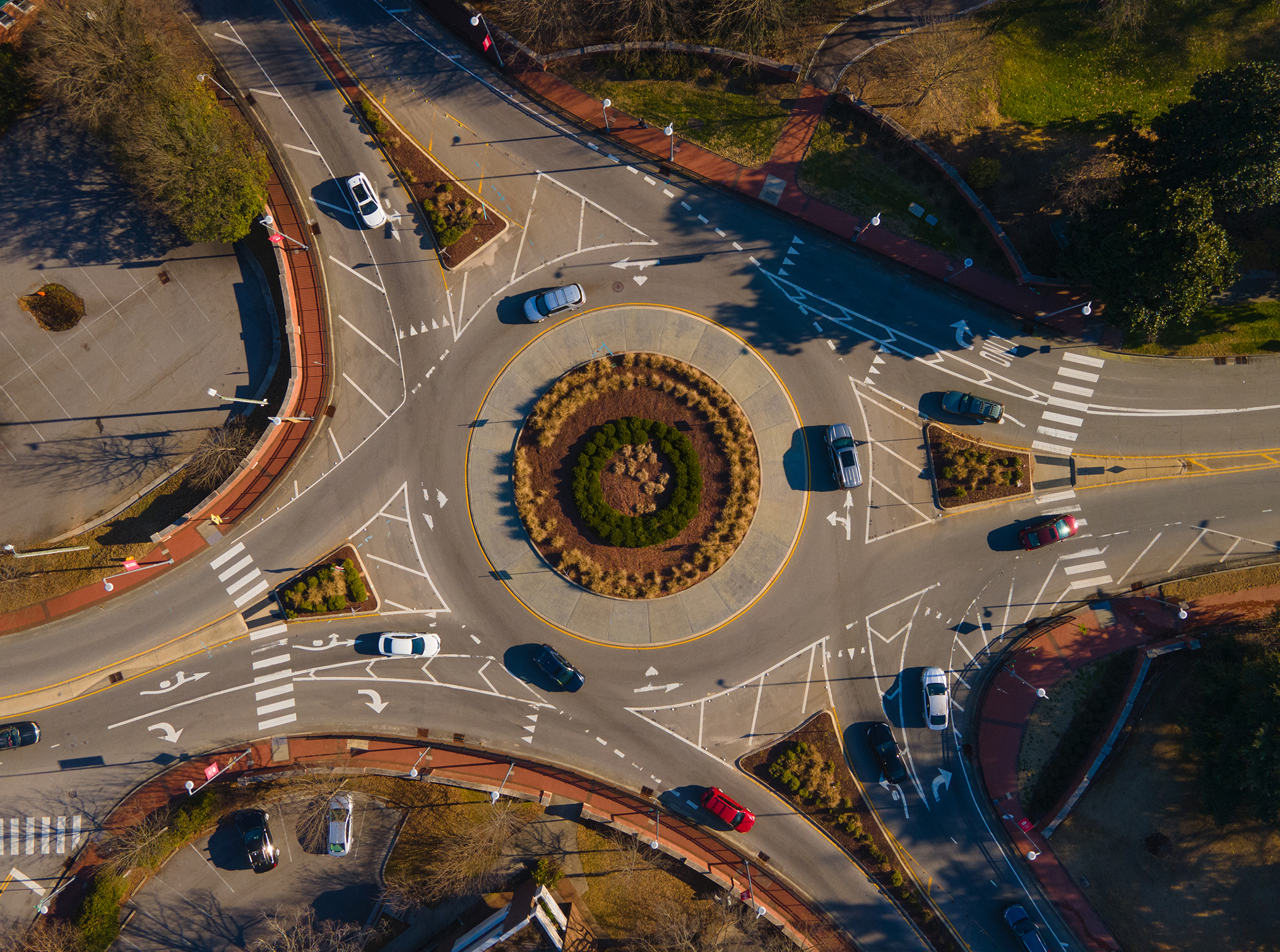 a roundabout with many cars
