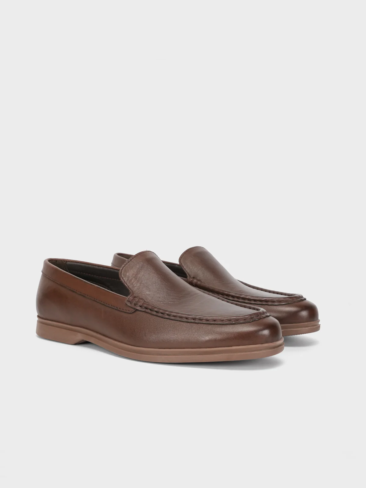 a pair of brown shoes