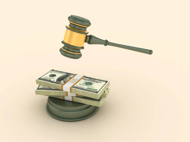 a gavel and stack of money