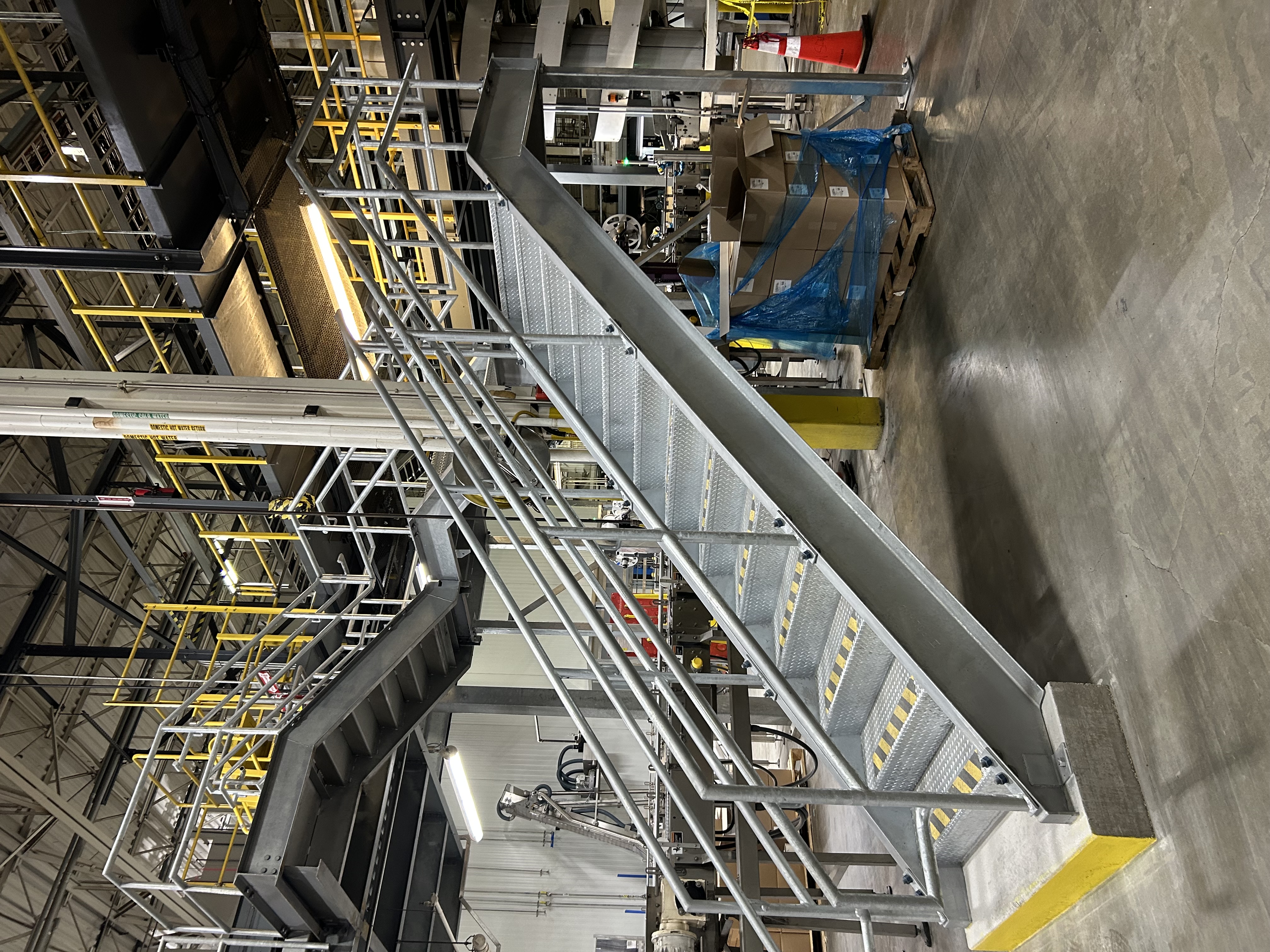 a metal staircase in a factory