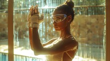 a woman wearing gloves and goggles