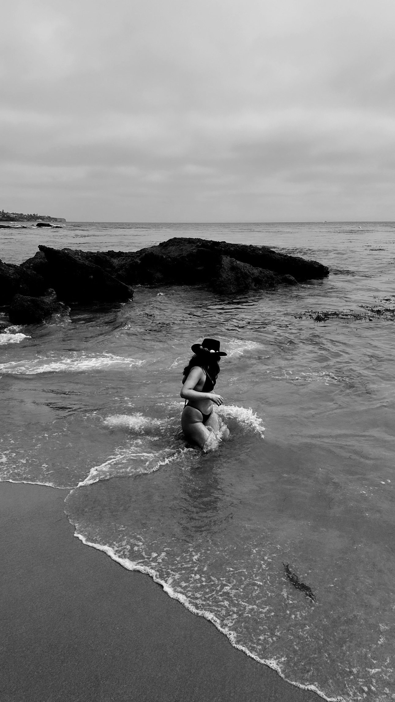 a woman in a garment in the water