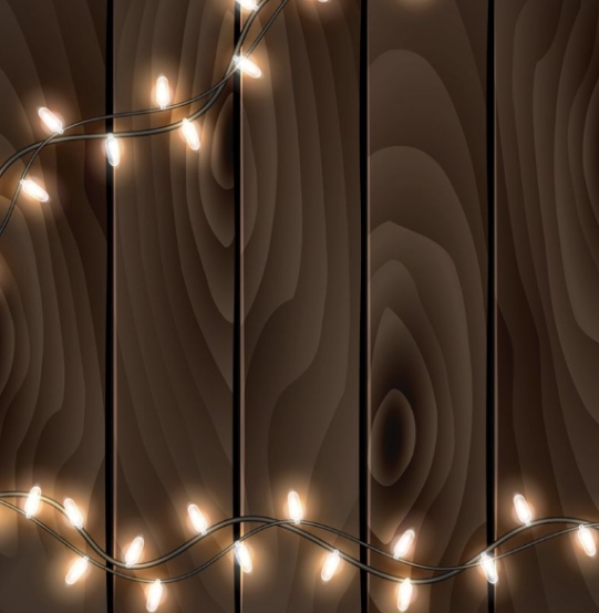 a string of lights on a wooden surface