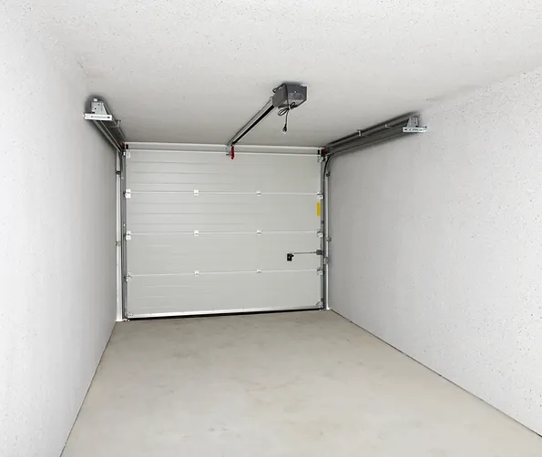 a garage door in a white room
