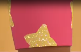 a yellow star on a pink background