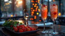 a plate of tomatoes and a glass of wine