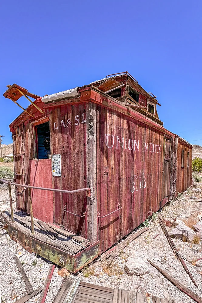 a old wooden building in the desert