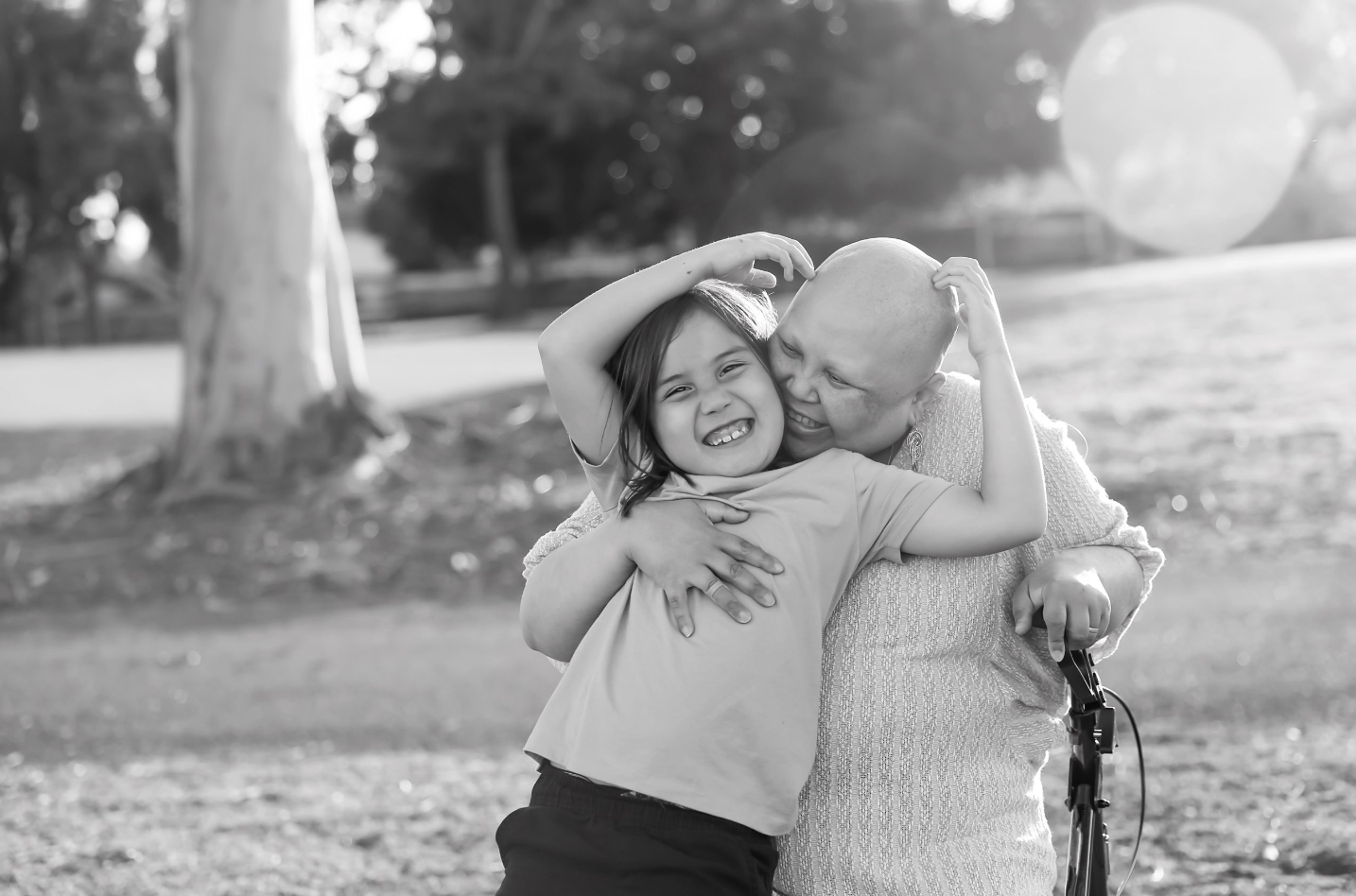 a woman hugging a child