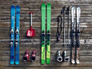a group of skis and snow boots