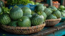 a group of watermelons in baskets