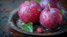 a group of apples on a plate