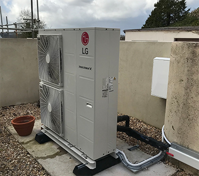 a large white box with a couple of fans