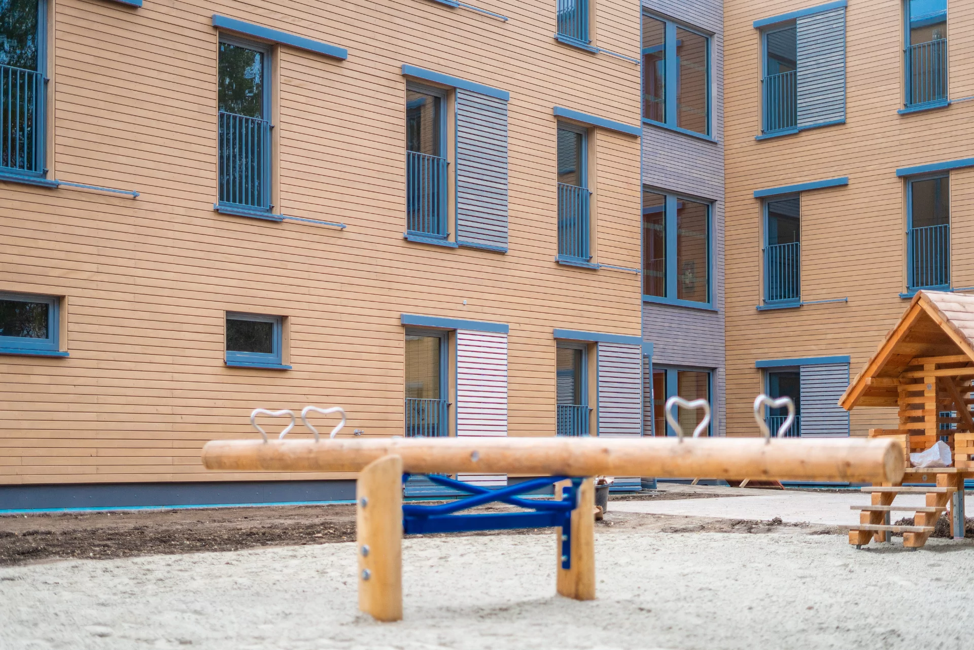 a playground in front of a building