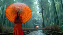 a woman in a red dress holding an umbrella